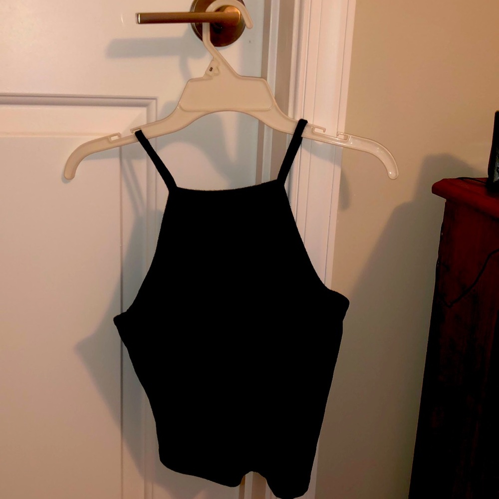 Small Garage semi cropped tank top high neck line. One black and one white.